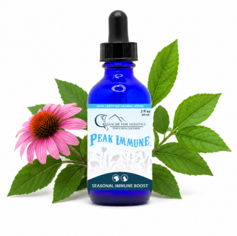 Blue glass dropper bottle of Peak Immune herbal supplement with a pink echinacea flower and green leaves.