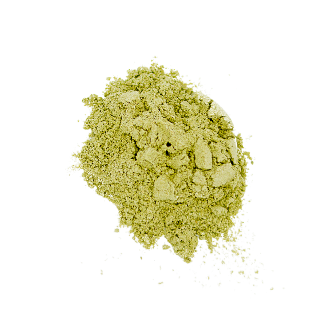A close-up of a pile of Peak Immune For Dogs & Cats green powder supplement, 100% organic herbs.