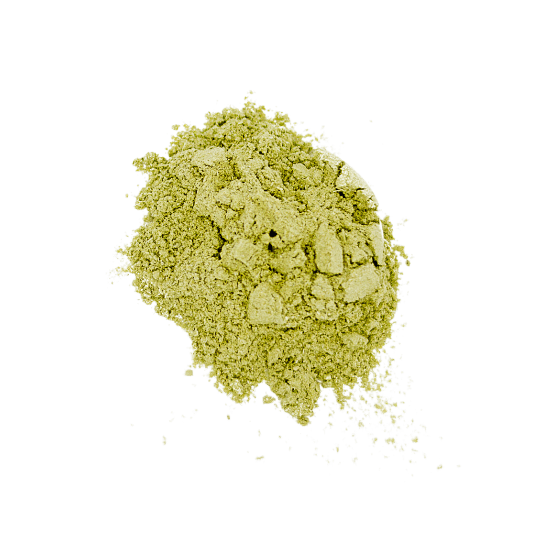 A close-up of a pile of Peak Immune For Dogs & Cats green powder supplement, 100% organic herbs.